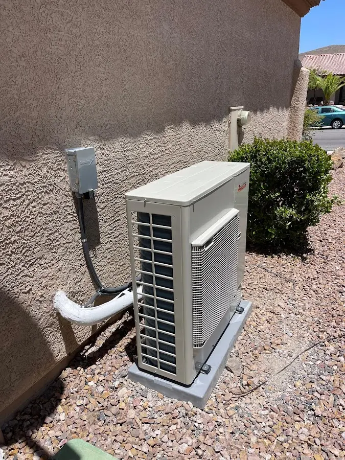 Residential air conditioning condenser unit in White Hall